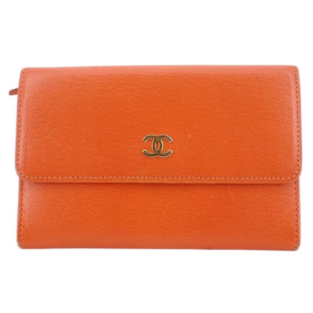 Pre loved authentic orange Chanel clutch wallet